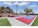 Shuffleboard court featuring benches, seating, and shade for a comfortable playing experience at 1803 Eagle Village Ave, Henderson, NV 89012