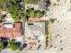 Birds eye view of property, neighboring homes, and desert landscaping at 2040 Tucuman Ave, Pahrump, NV 89048