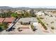 Aerial view of home with desert landscaping and spacious driveway at 2040 Tucuman Ave, Pahrump, NV 89048