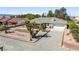 Beautiful home with desert landscaping and a well-maintained front yard with circular driveway at 2040 Tucuman Ave, Pahrump, NV 89048