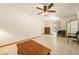 Living room features tiled flooring and access to the backyard patio at 2040 Tucuman Ave, Pahrump, NV 89048