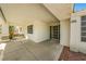 Inviting covered patio area with decorative columns and a bench, perfect for outdoor seating at 2040 Tucuman Ave, Pahrump, NV 89048