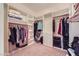 Spacious walk-in closet with custom shelving and ample storage space at 2116 Burtonsville Dr, Henderson, NV 89044
