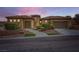 Stunning single-story home with two-car garage, tile roof, and desert landscaping at 2116 Burtonsville Dr, Henderson, NV 89044