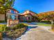 The fitness and activities center features stone accents, manicured landscaping, and convenient bike racks at 2116 Burtonsville Dr, Henderson, NV 89044