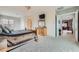 Spacious main bedroom with plush carpet, chandelier, and ample natural light at 2116 Burtonsville Dr, Henderson, NV 89044
