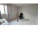 Spacious bedroom featuring tile flooring and ample natural light at 2125 Flower Ave, North Las Vegas, NV 89030