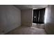 Cozy bedroom featuring tile flooring and a private closet at 2125 Flower Ave, North Las Vegas, NV 89030