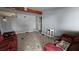 Inviting living room featuring tile flooring and a cozy seating area at 2125 Flower Ave, North Las Vegas, NV 89030
