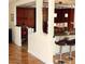 View of the living room and breakfast bar with laminate flooring at 2569 Malabar Ave, Las Vegas, NV 89121