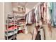 Well-organized walk-in closet with ample shelving and hanging space, perfect for maximizing storage and staying organized at 2853 Blythswood Sq, Henderson, NV 89044