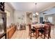 Cozy dining area with ample natural light, stylish decor, and a seamless flow to other living spaces at 2853 Blythswood Sq, Henderson, NV 89044