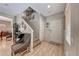 Entryway showcasing a staircase, front door, and luxury vinyl plank flooring at 2853 Blythswood Sq, Henderson, NV 89044