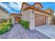 Inviting two-story home featuring a well-maintained yard, two-car garage, and beautiful landscaping at 2853 Blythswood Sq, Henderson, NV 89044