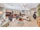 Open living room featuring hardwood floors, neutral colors, and access to the kitchen at 2853 Blythswood Sq, Henderson, NV 89044