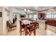 Open living space featuring a combined kitchen, dining area, and living room for easy living and entertaining at 2853 Blythswood Sq, Henderson, NV 89044