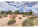 Esselmont Park entrance sign amidst desert landscaping, promising outdoor recreation and a welcoming community at 2853 Blythswood Sq, Henderson, NV 89044