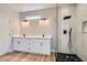 Modern bathroom with double vanity and a luxurious glass shower at 3017 Walnut Park Ct, Henderson, NV 89052