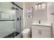 Modern bathroom featuring a glass shower, sleek black fixtures, and a contemporary vanity at 3017 Walnut Park Ct, Henderson, NV 89052
