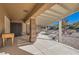 Spacious covered patio with textured pillars, overlooking the landscaped backyard at 3017 Walnut Park Ct, Henderson, NV 89052