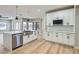 Modern kitchen with white cabinets, stainless steel appliances, and an open layout at 3017 Walnut Park Ct, Henderson, NV 89052