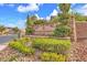 Stone monument sign that reads Coldwater Ranch nestled amongst rock landscaping and shrubbery at 309 Gemstone Hill Ave, North Las Vegas, NV 89031