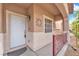 Inviting covered front porch with decorative accents, creating a warm and welcoming entrance to the home at 309 Gemstone Hill Ave, North Las Vegas, NV 89031