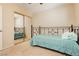 Cozy bedroom showcases a mirrored closet and neutral carpet, creating a comfortable and inviting space at 3360 Cheltenham St, Las Vegas, NV 89129