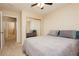 Bedroom boasts a closet with mirrored doors, soft carpet, and a comfortable queen-size bed at 3360 Cheltenham St, Las Vegas, NV 89129