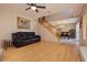 Open-concept living space leading to the dining area and staircase at 3360 Cheltenham St, Las Vegas, NV 89129