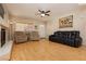 Comfortable living room with wood floors, fireplace, and neutral color palette at 3360 Cheltenham St, Las Vegas, NV 89129