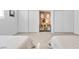 Bedroom featuring neutral carpet, two beds, and ample closet space at 3611 Valencia St, Las Vegas, NV 89121