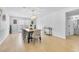 Bright dining room with a stylish light fixture and easy access to the backyard at 3611 Valencia St, Las Vegas, NV 89121