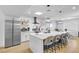 Bright kitchen with stainless steel appliances, sleek countertops, and a breakfast bar at 3611 Valencia St, Las Vegas, NV 89121