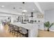 Stunning kitchen featuring a large island, modern appliances, and stylish pendant lighting at 3611 Valencia St, Las Vegas, NV 89121