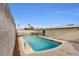 Inviting pool with refreshing blue water surrounded by a concrete patio at 3611 Valencia St, Las Vegas, NV 89121