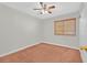 Bedroom with ceiling fan, carpet flooring, window with blinds and neutral walls at 3692 Rawhide Ct, Las Vegas, NV 89120