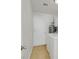 Laundry room area with tile flooring, washer, dryer, water heater and a white door at 3692 Rawhide Ct, Las Vegas, NV 89120