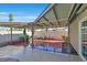 Covered patio area featuring overhead covering and a table and chairs, perfect for outdoor dining and relaxation at 3692 Rawhide Ct, Las Vegas, NV 89120