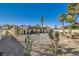 Scenic view of a backyard with a pool, desert landscaping, and privacy at 3788 Forestcrest Dr, Las Vegas, NV 89121