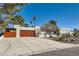 Spacious single-story home with a large two-car garage and concrete driveway and desert landscaping at 3788 Forestcrest Dr, Las Vegas, NV 89121