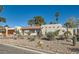 Charming single-story home featuring a terra cotta roof, desert landscaping, and an attached two-car garage at 3788 Forestcrest Dr, Las Vegas, NV 89121