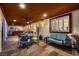 A covered patio with a dining area, ceiling fans, seating, and recessed lighting at 3788 Forestcrest Dr, Las Vegas, NV 89121