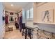 Spacious walk-in closet featuring custom shelving, drawers, and ample storage space at 3788 Forestcrest Dr, Las Vegas, NV 89121