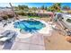 Aerial view of a backyard featuring an RV, pool, and fire pit at 3809 Vincelli Ave, North Las Vegas, NV 89031