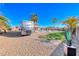 This backyard features an RV, a pool, and a grass area at 3809 Vincelli Ave, North Las Vegas, NV 89031