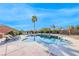 An in-ground pool with chairs and a manicured backyard with an RV at 3809 Vincelli Ave, North Las Vegas, NV 89031