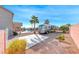 Beautiful backyard with RV parking, manicured landscaping, and a sparkling pool at 3809 Vincelli Ave, North Las Vegas, NV 89031