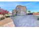 Charming two-story home with desert landscaping, gated driveway and tiled roof at 3809 Vincelli Ave, North Las Vegas, NV 89031