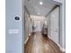 Modern entry showcasing beautiful flooring, neutral walls, and ample natural light at 3809 Vincelli Ave, North Las Vegas, NV 89031